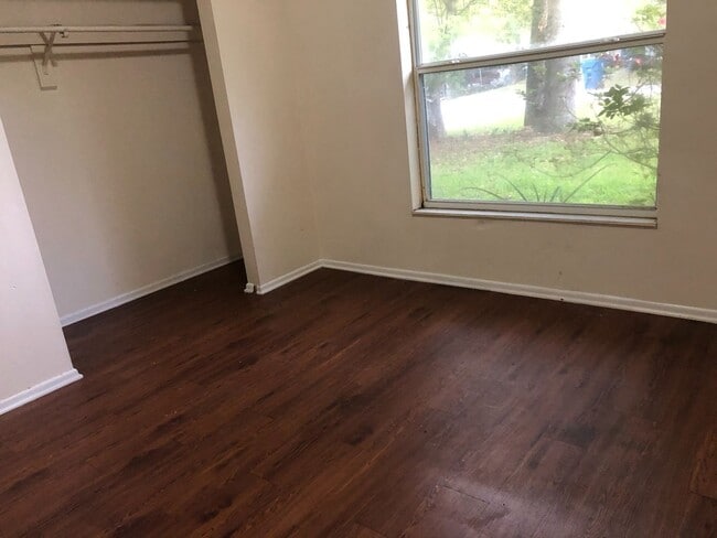 Building Photo - SPACIOUS 3BR/1.5BA w/Carport, Beautiful Wood Finish Flooring, Privacy Fenced Backyard! NO APP FEE!