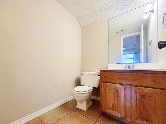 Building Photo - Warm & Inviting 4BR / 2.5BA Home with Covered Deck and 2-Car Garage