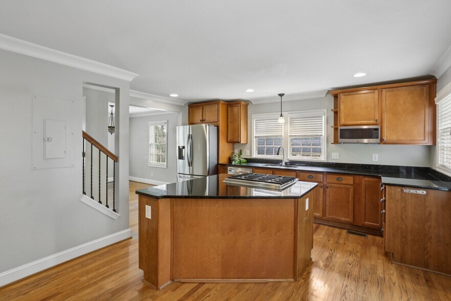 View of kitchen, flows into the dining room and living room - 781 Rosedale Ave SE