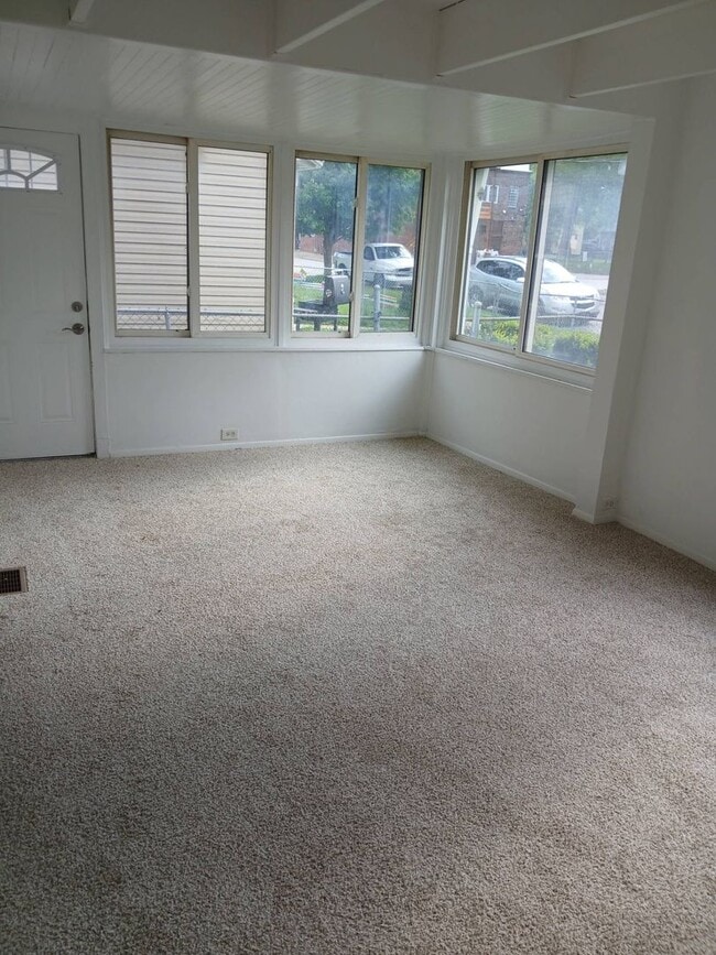 Building Photo - Newly Renovated 4BR/1BA Single-Family Home with Garage – Cleveland