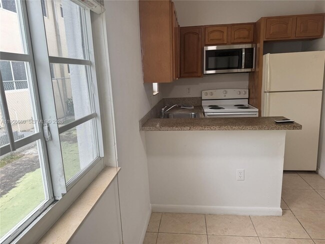 Building Photo - 7130 Rue Versailles Dr