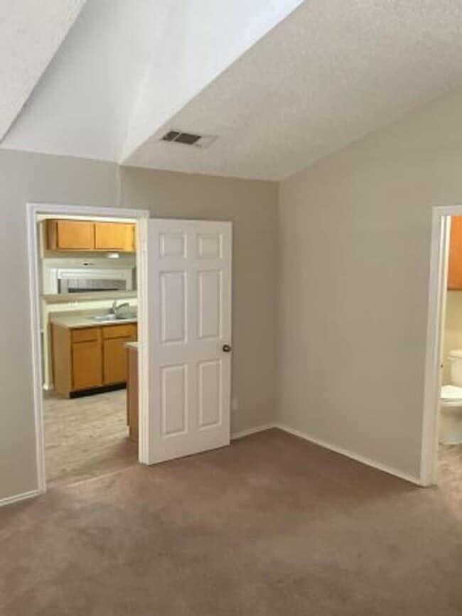 Building Photo - This incredible three bedroom home is minutes away from Lake Travis