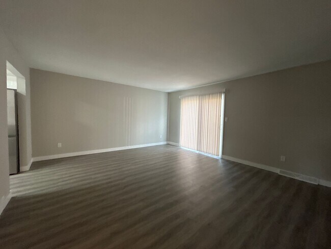 Building Photo - Beautifully Redone 3-Bedroom, 1.5-Bathroom Condo with Attached Garage – $1,725/Month (Lawn Care &...