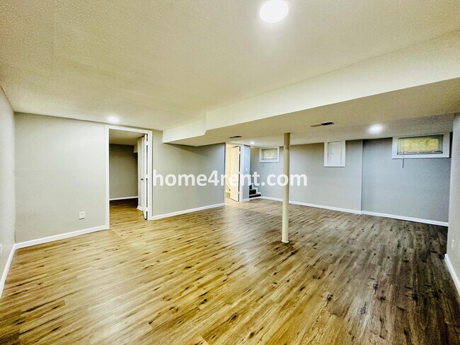 Building Photo - Like New, Ranch Style Home in Raytown - Wood Floors, Finished Basement, Fenced Yard!