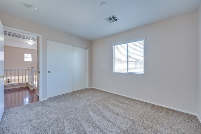 Building Photo - NW!! POOL!!!! GATED!!! Com. Park!!! Low Maintenance desert landscape front Yard. New Carpet!! Ups...