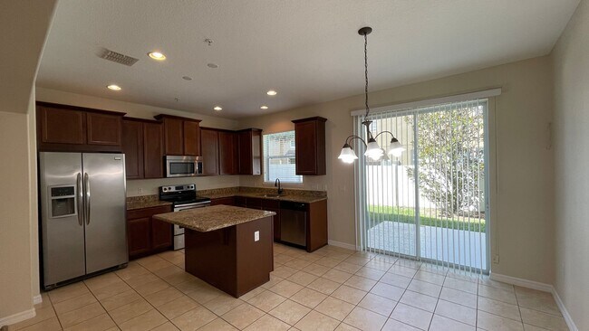 Building Photo - 9484 Strongbark Ln
