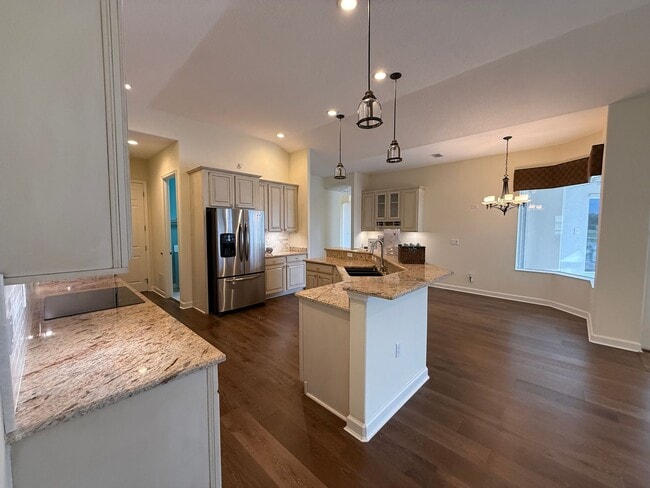 Building Photo - Luxurious 4 Bedroom 3 Bath Lakefront Pool Home W/3-Car Garage