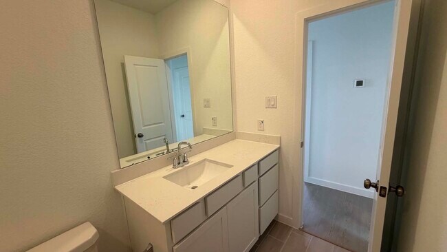 Building Photo - 27451 Sunterra Village Dr
