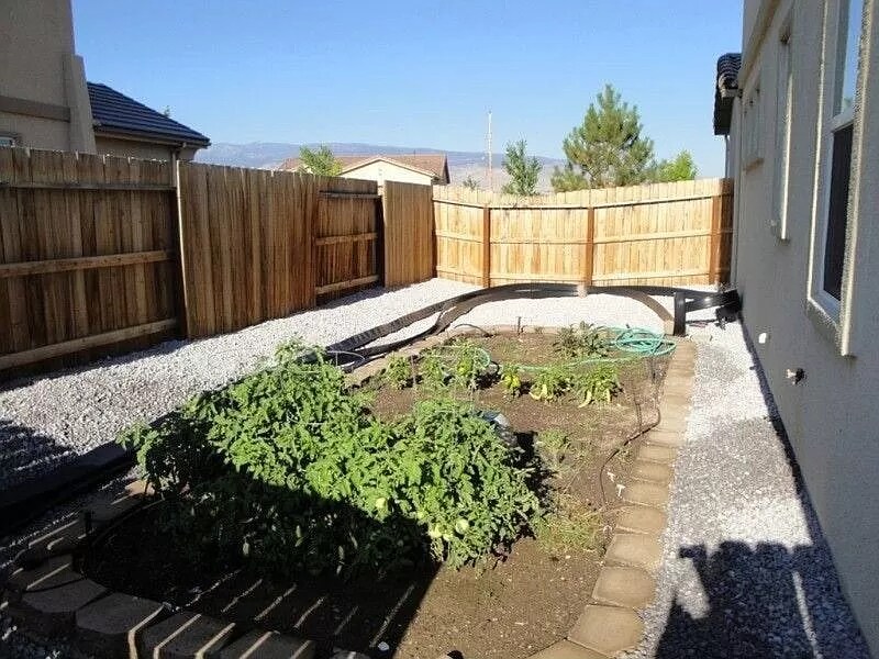 This fenced garden area has irrigation ready for the spring! - 10108 Gold Mine Dr