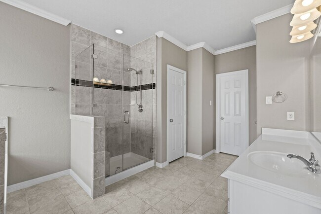 Building Photo - Luxury Townhome with Attached Garage & Outdoor Entertaining Area - $100 off first and second mont!