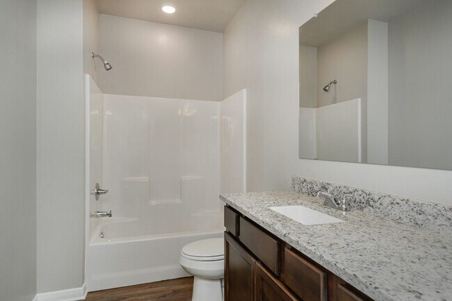 Building Photo - Live, love, and grow in this charming townhome!