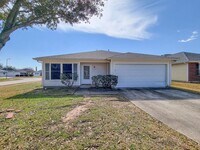 Building Photo - 3 bedroom one story home on large corner lot. Home has hard flooring throughout living areas and ...