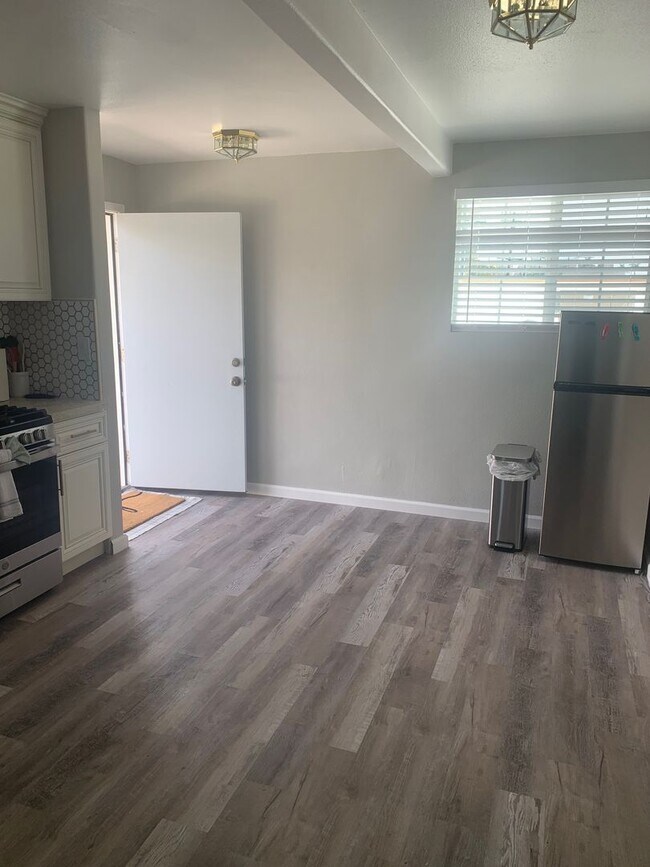 Building Photo - Furnished, Upstairs Apartment with 2 bedrooms and 1 bathroom. Utilities Included!!