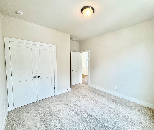 Building Photo - Your Alpharetta Retreat Awaits – Elegant T...
