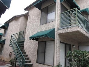 Building Photo - CENTRAL - GATED WITH POOL AREA
