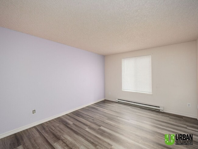 Building Photo - Comfortable 1-Bedroom Condo with Parking & Resort-Style Amenities