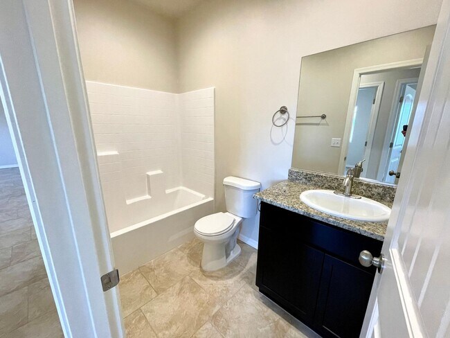 Building Photo - Centrally Located 3BR Home Near Airway Ave | Granite Kitchen, 2-Car Garage & Fenced Yard!