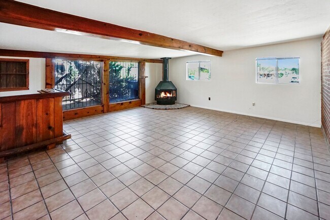 Building Photo - Eastside home- 4 bedroom/ 2 bathrooms, pool and large backyard