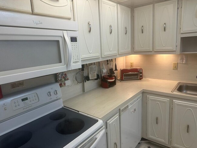 Building Photo - Furnished 2 Bedroom, 2 bath condo across f...