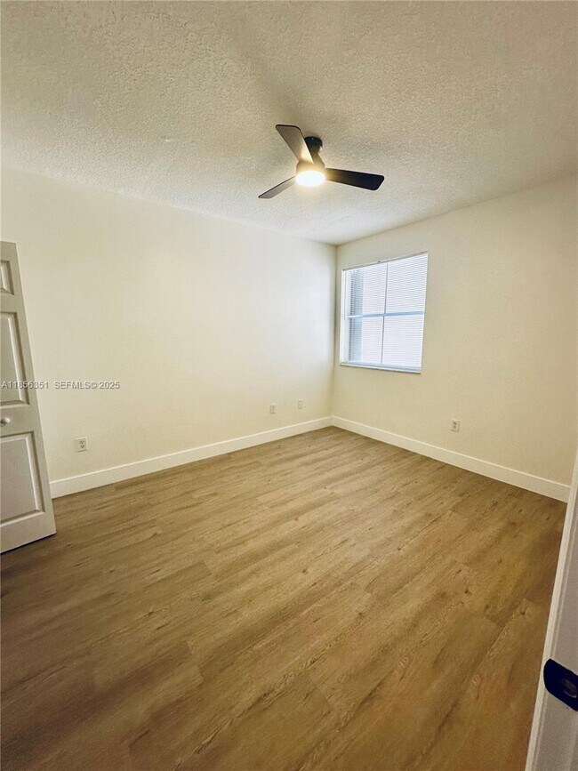 Building Photo - 6630 NW 114th Ave