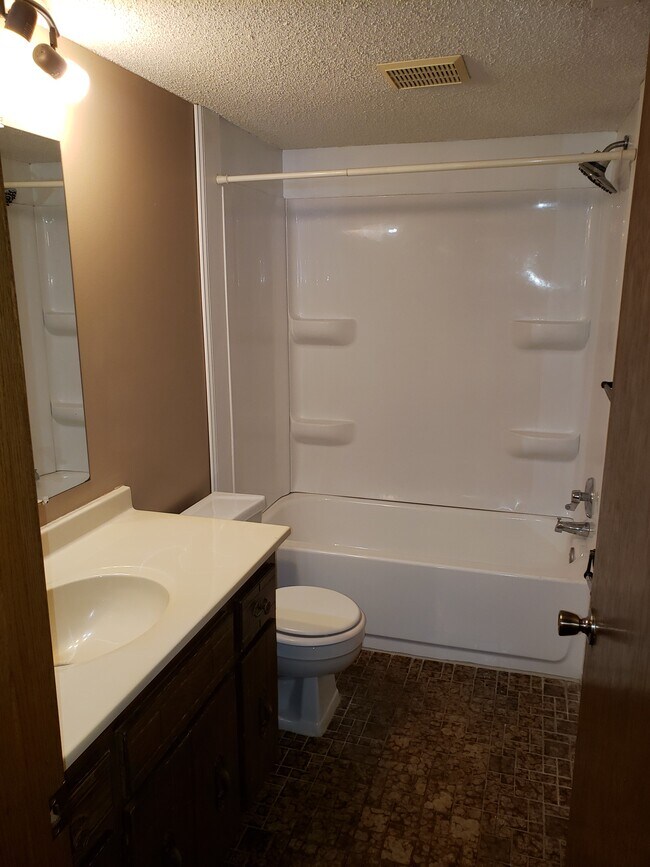 Main Full Bath - 7948 Ewing Ave N