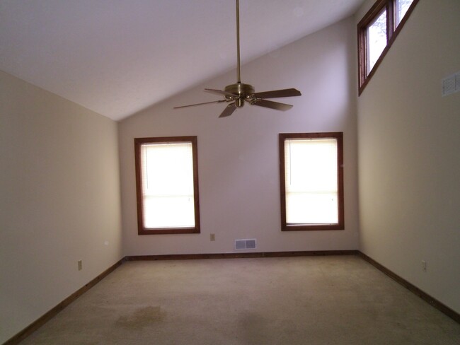 Master Bedroom Suite with vaulted ceiling, walk-in closet and private bathroom - 3466 Winter Hill Drive