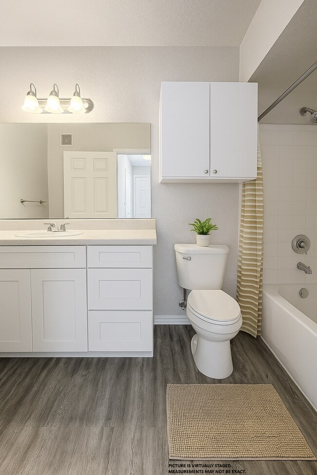 Building Photo - 2x2 Conveniently located. Large open concept, bright and updated: 1075 square feet.