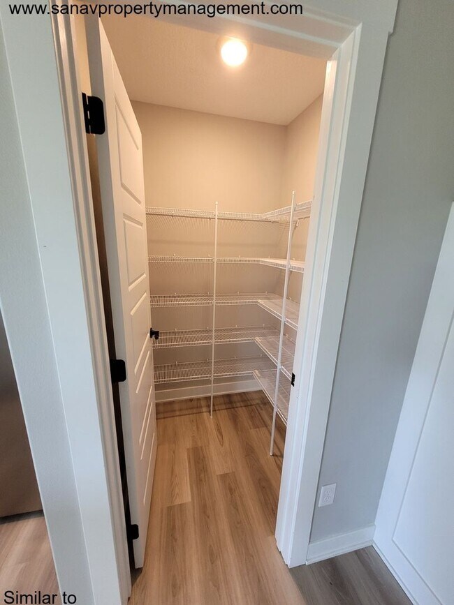 Building Photo - Spacious 4-Bedroom Home – Move-In Ready!