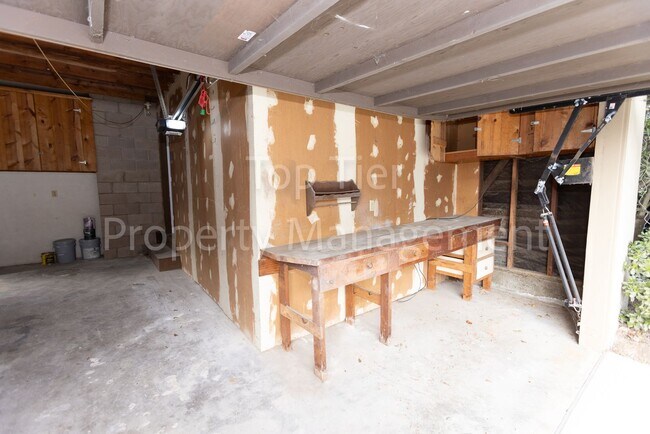 Building Photo - Charming Mid-Century Home | 4BR, 3BA | 2,4...