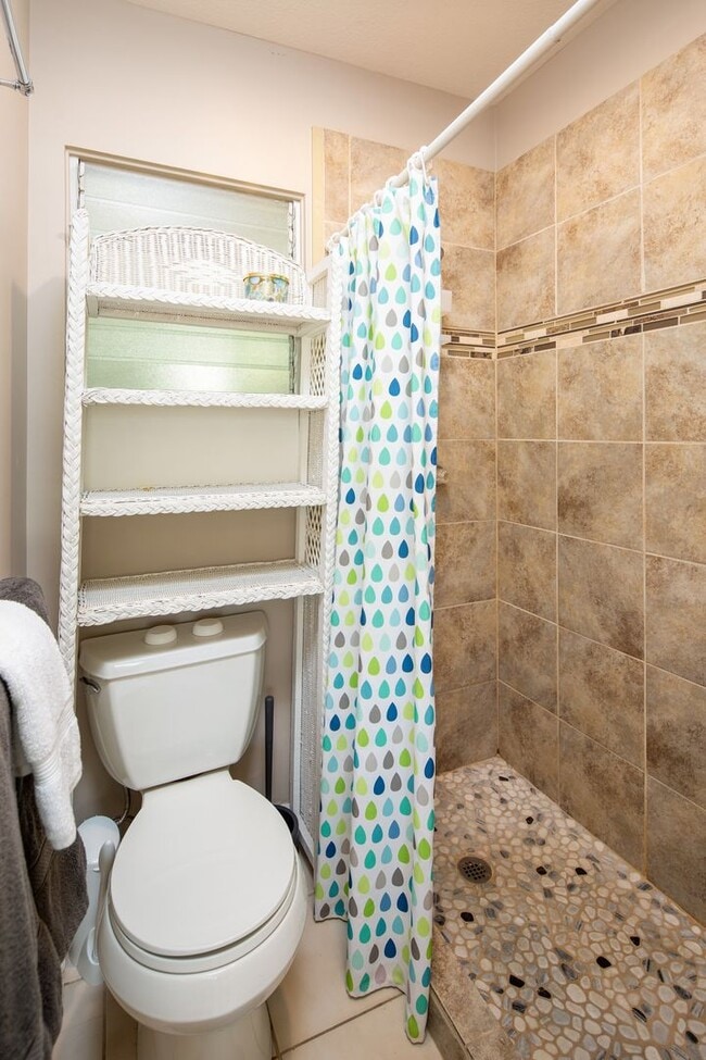 Building Photo - Fully furnished beach-side studio includes...