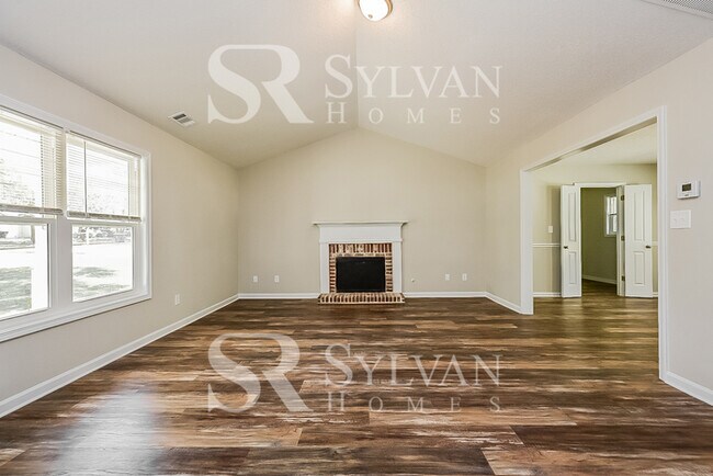 Building Photo - The living is easy in this 3 bedroom, 2 bathroom home