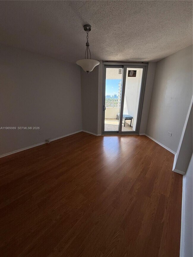 Building Photo - 5555 Collins Ave