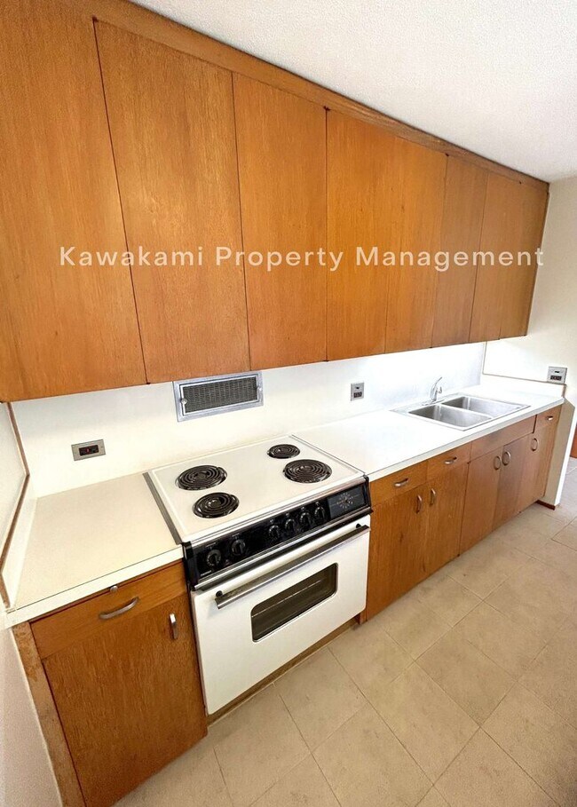 Building Photo - 18th Floor Queen Emma Gardens Apartment - ...