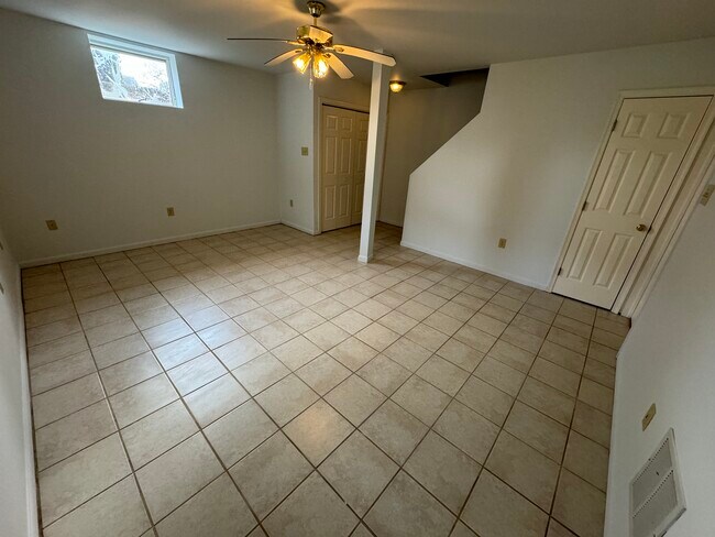 Family room in basement - 1048 Dual Pl