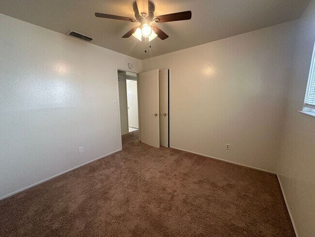 Building Photo - Three Bedroom Two Bathroom Home with Yard