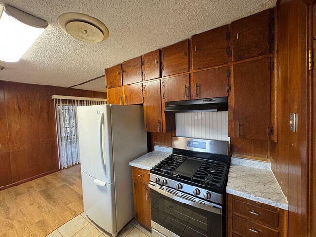 Building Photo - Charming 3 Bedroom, 2 Bath Home with 2-Car Garage & Large Fenced Yard