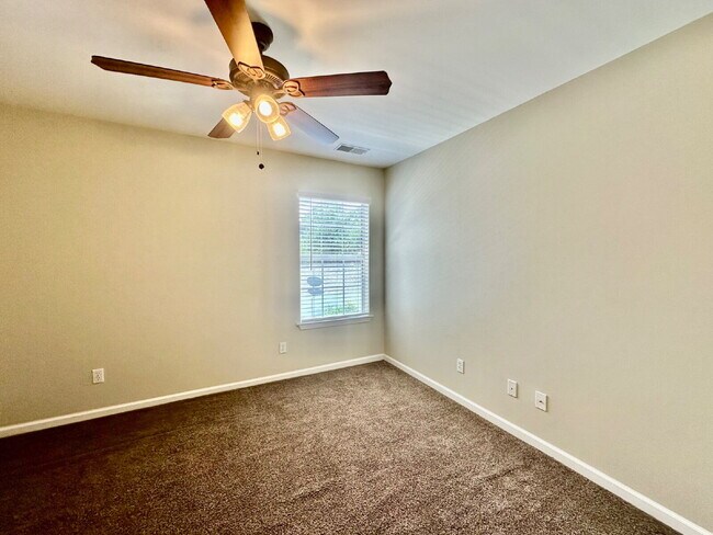 Building Photo - Four Bedroom Home with Private Fenced Back Yard in the Farm!