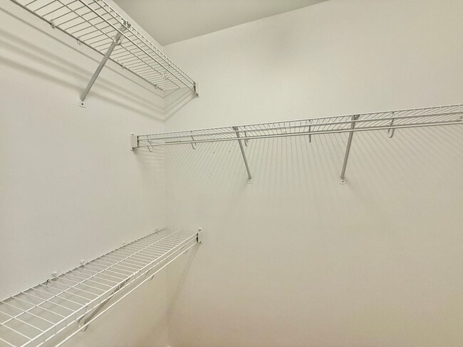 Building Photo - Modern 3BD, 2.5BA End Unit Raleigh Townhome with HOA Amenities Near I-540 & Triangle Town Center