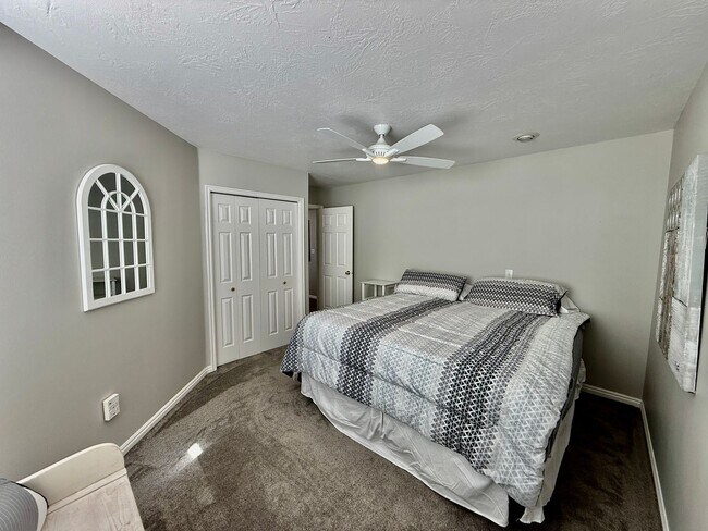 Building Photo - Furnished and Utilities Included: Two-Bedroom Basement Apartment with Private Yard