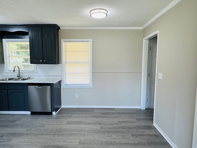 Building Photo - 4-Bedroom that has it all !