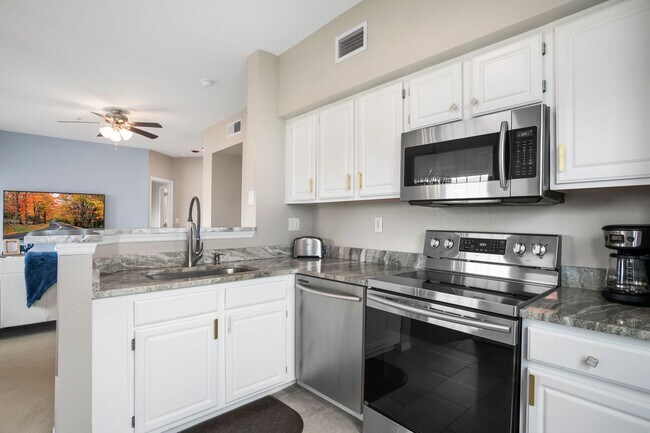 Building Photo - ** THE TIDES AT PELCIAN LANDING ** 2 BED /...