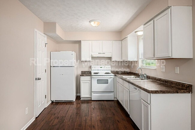 Building Photo - 7179 Feather Ct