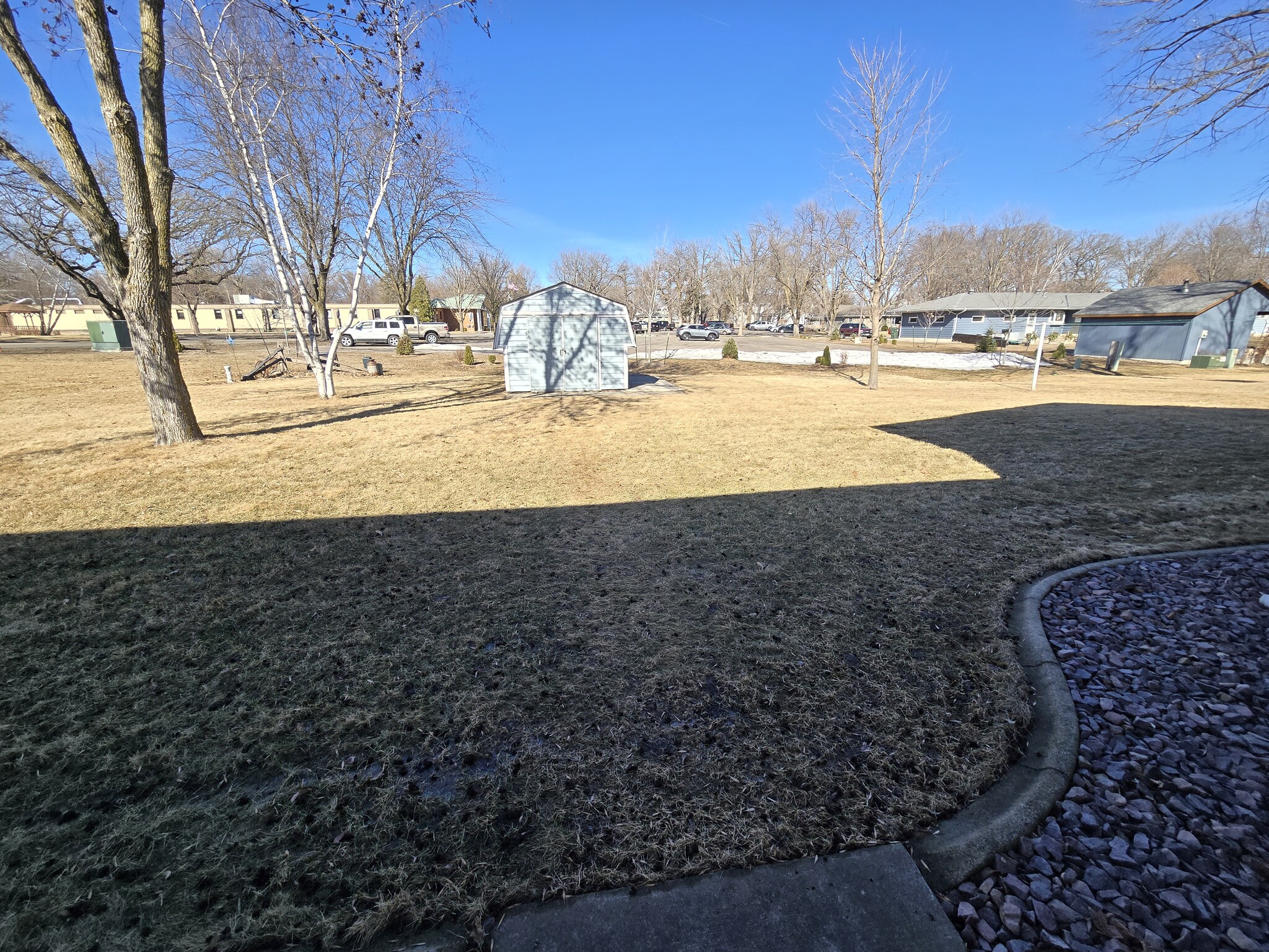 Back yard with storage shed and clothesline - 775 Madson Ave SW