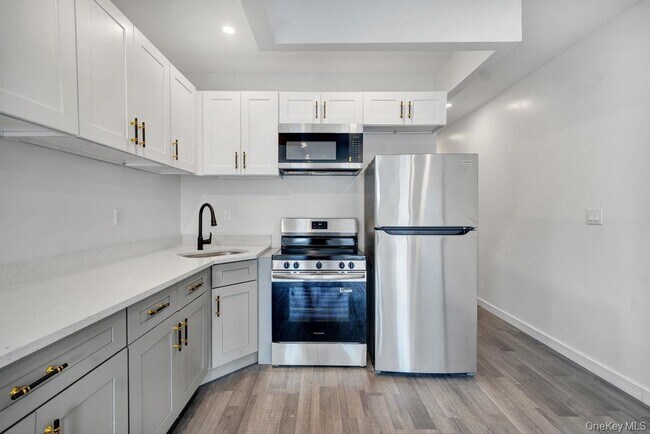 Building Photo - 1707 Pitkin Ave