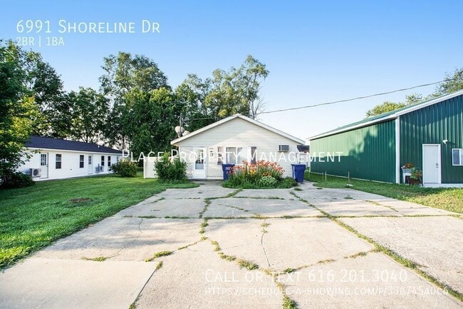 Building Photo - 6991 Shoreline Dr