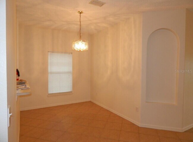 Building Photo - **Charming 4BR/2BA Pond-View Home with Boat Ramp Access – East Orlando **