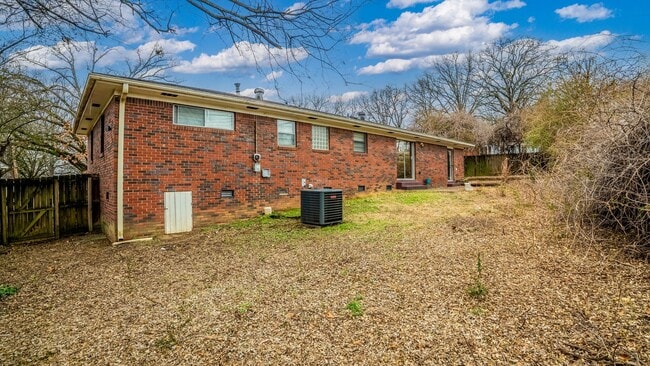 Building Photo - Updated 3BR/2BA Brick Home with Hardwood Floors & Large Yard
