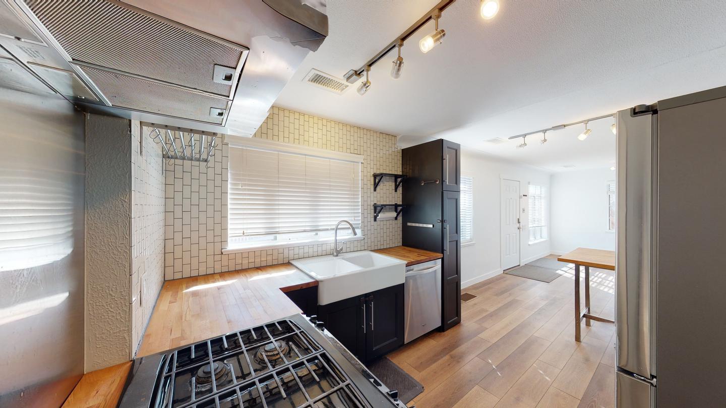 Building Photo - Bright & beautiful South Park Hill duplex property with large fenced shared yard