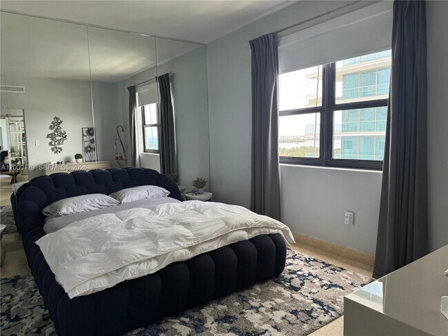 Building Photo - 10185 Collins Ave