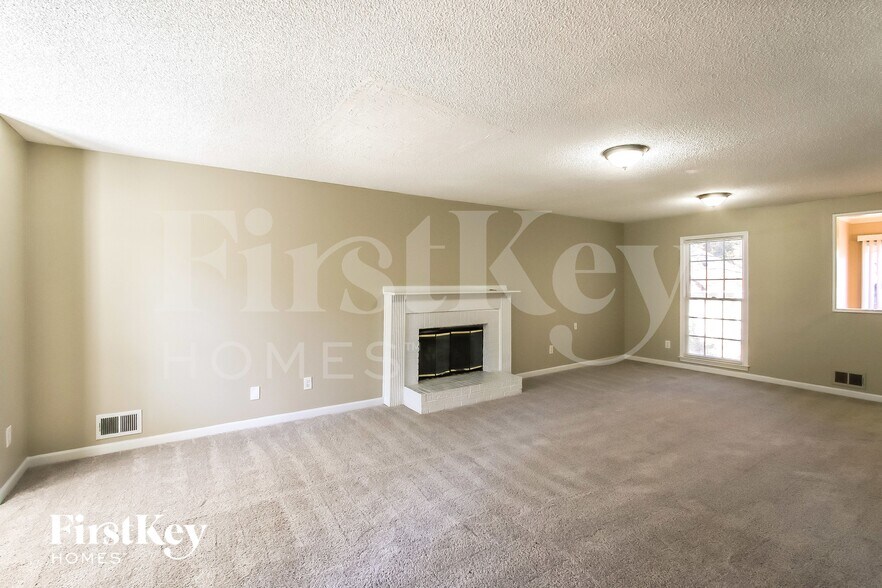 Building Photo - 130 Whisperwood Ln